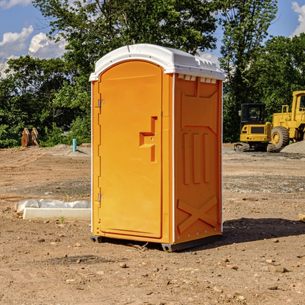 how often are the portable restrooms cleaned and serviced during a rental period in Milan